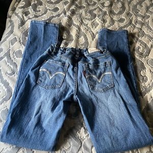 Good used condition Levi skinny jeans. Rubber waist and inside elastic